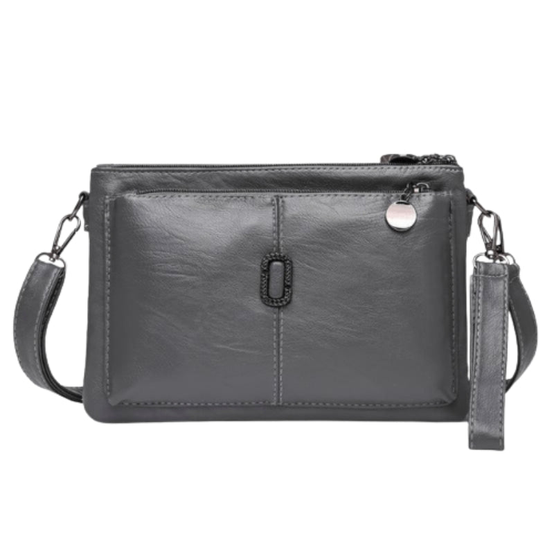 Delilah - Lille Skuldertaske med Ristlommer og Justerbar Rem