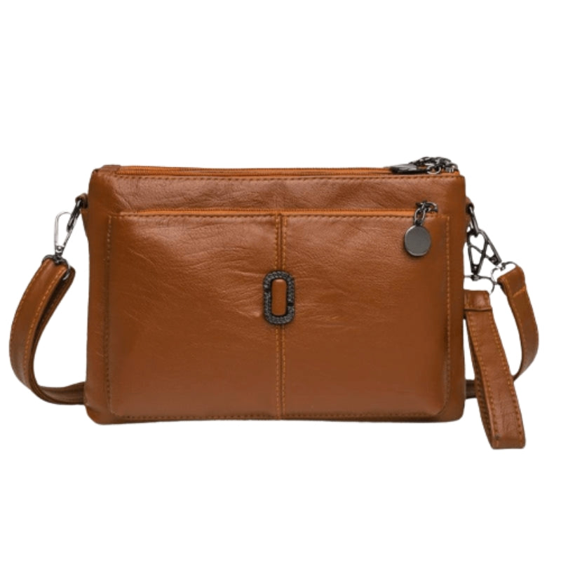 Delilah - Lille Skuldertaske med Ristlommer og Justerbar Rem